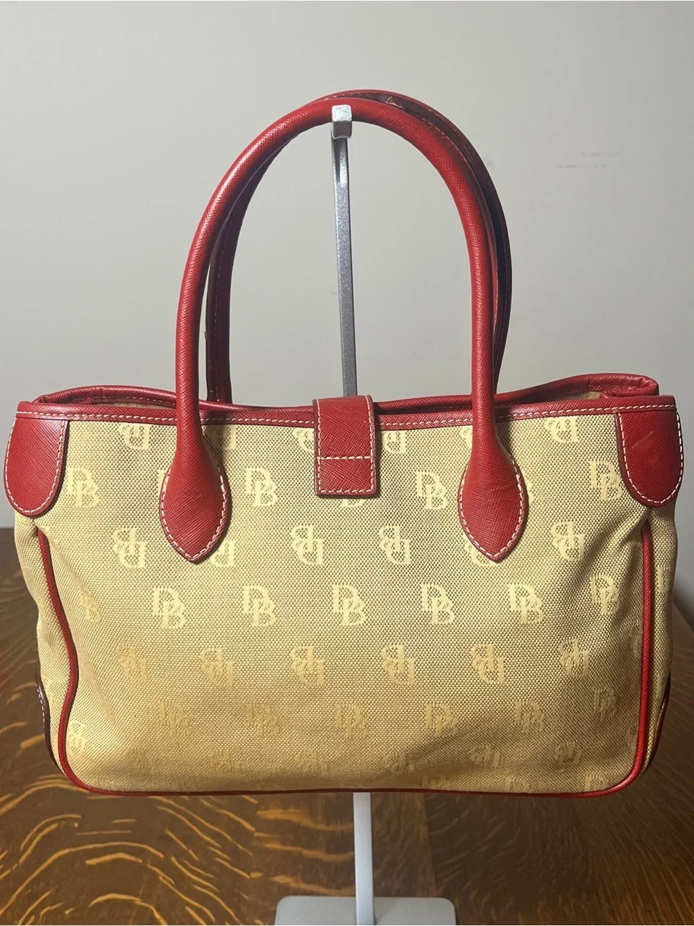 Dooney & Bourke Tan Monogram Canvas Satchel with Red Leather Trim Silver Lock.